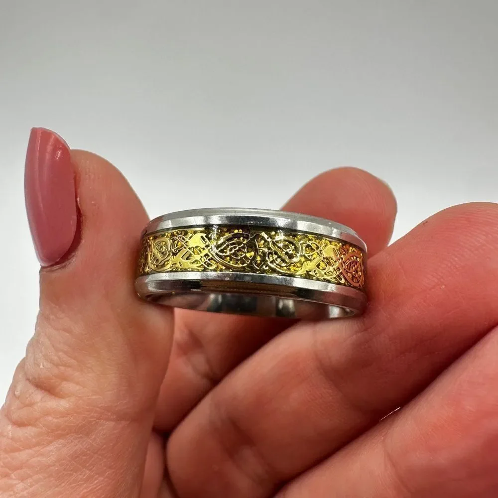 Men's size 13, Silver tone‎ metal with silver/gold scroll work in center, ring!